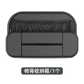 Black leather car seat rear storage bag attached to a vehicle seat, showing its storage box shape.