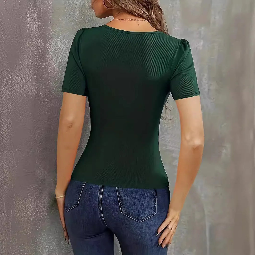 Women's wine red slim fit knitted short sleeve top with low V-neck on a model