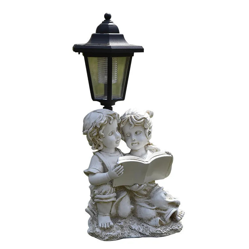 Hexagonal solar garden lamp with decorative resin animal design in outdoor setting