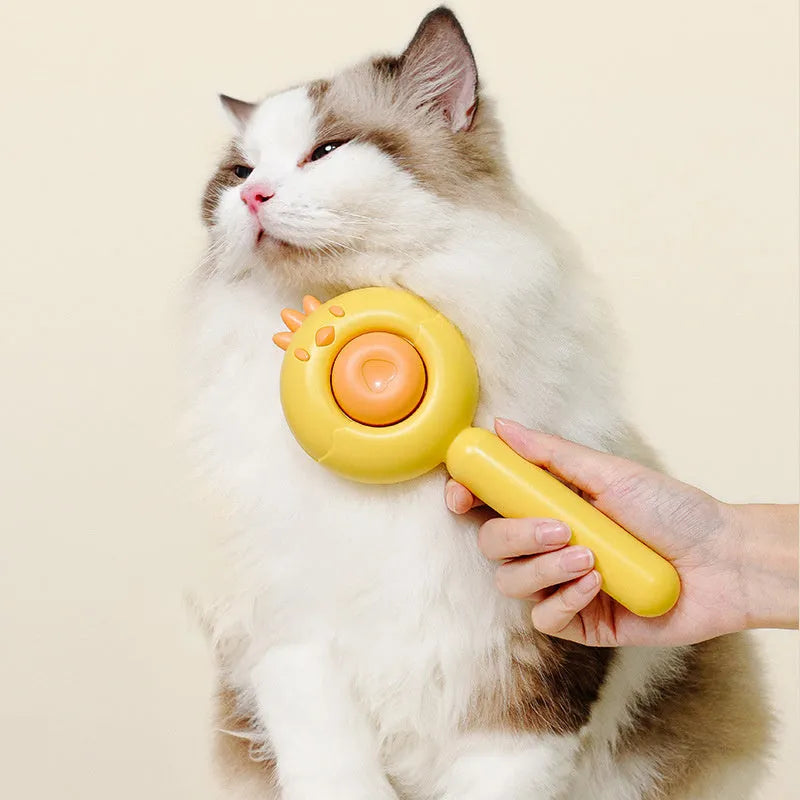 Purple self-cleaning pet grooming brush with stainless steel bristles and a one-button mechanism.