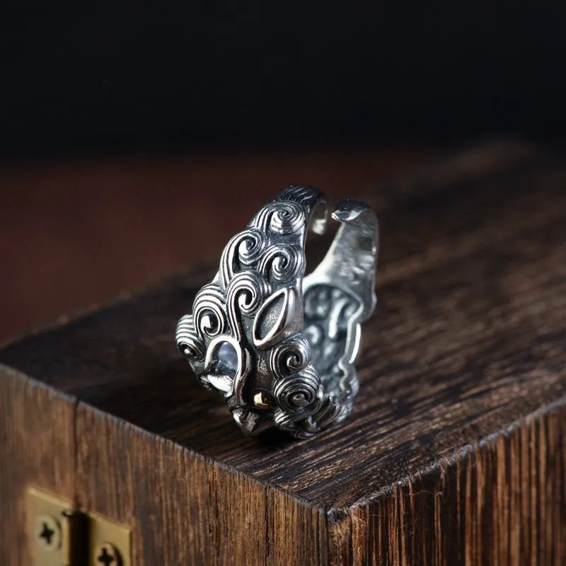 Sterling silver open ring with detailed Domineering Diamond and Jibeast animal pattern.