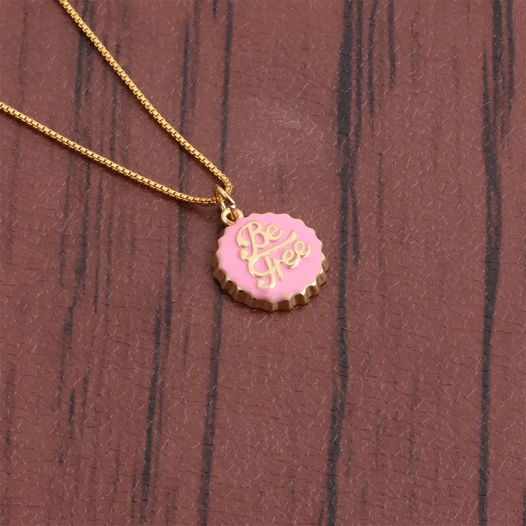 Gold-plated copper Be Free bottle cap pendant necklace on a 40cm box chain.