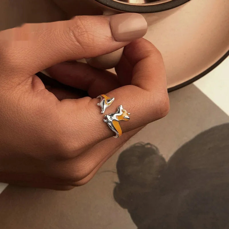 Silver cartoon corgi dog ring for women with electroplated finish.