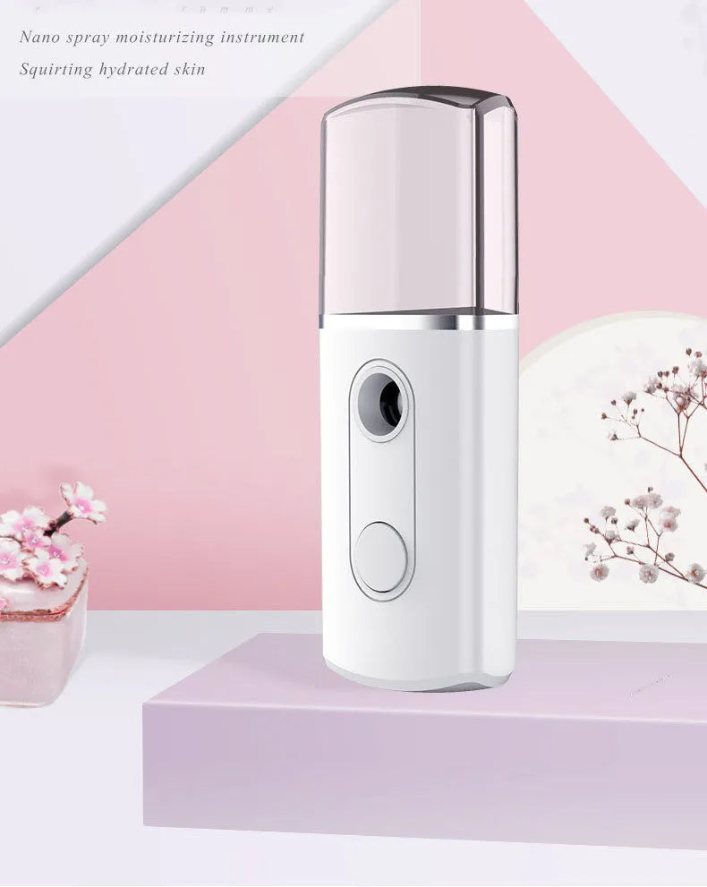 Portable facial nano mist humidifier in white with 20ml tank and compact 10cm body