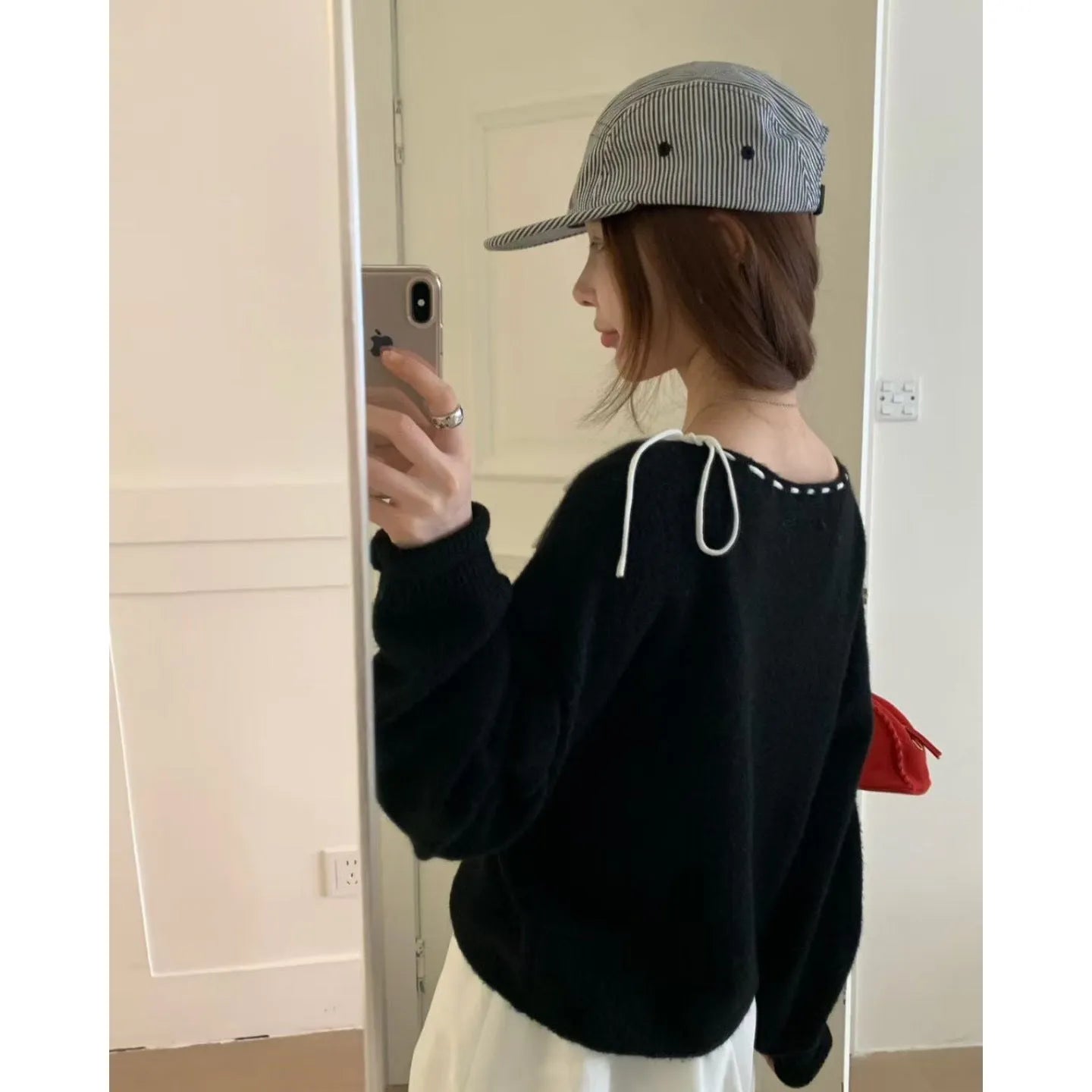 Women's loose-fitting black knitwear pullover jumper with regenerated cellulose fibre construction