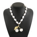 Gold electroplated alloy fruit necklace with pearl chain adjustable from 51cm to 60cm