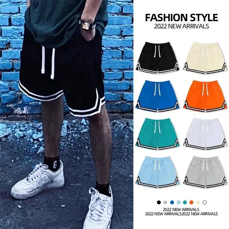 Men's loose fit sports shorts in polyester fabric available in multiple colours