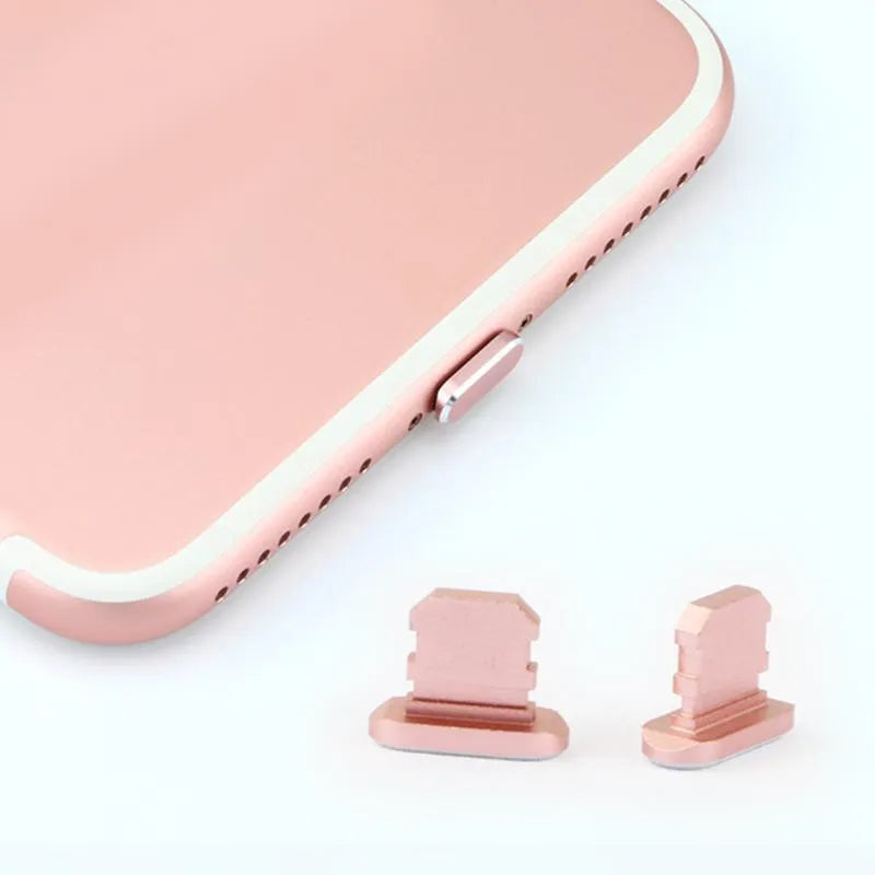 Aluminium alloy dust plug for iPhone charging port in various colours including gold, silver and rose gold.