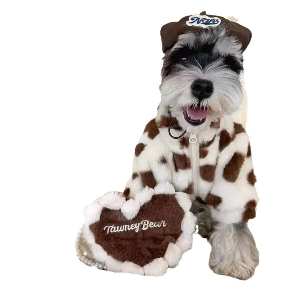 Small dog wearing British-style pink polyester plush winter coat suitable for Pomeranian or Bichon Frise breeds
