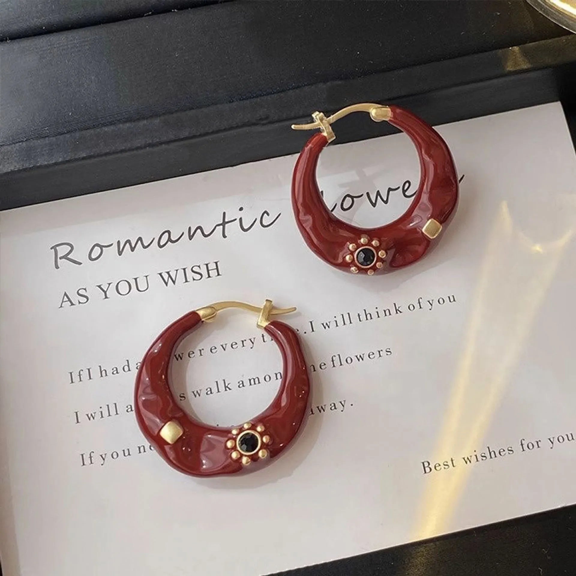 Hong Kong style retro ear studs with dripping oil treatment and rhinestone detail