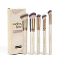 Apricot coloured 5-piece angled makeup brush set with synthetic bristles for powder and blush application