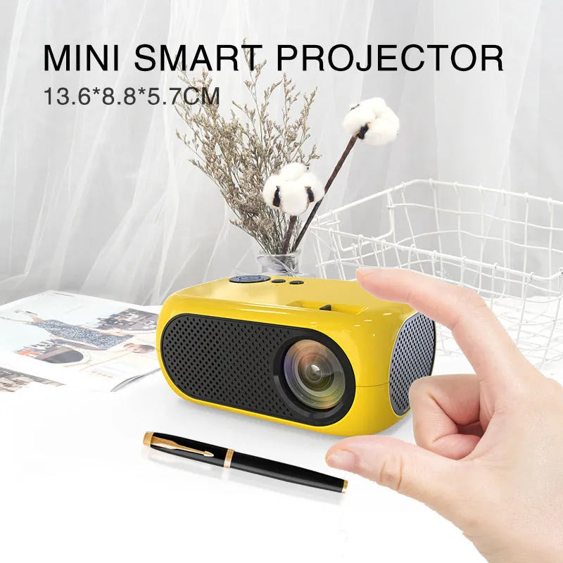 M24 portable micro projector in gold or white colour with power adapter and AV cable