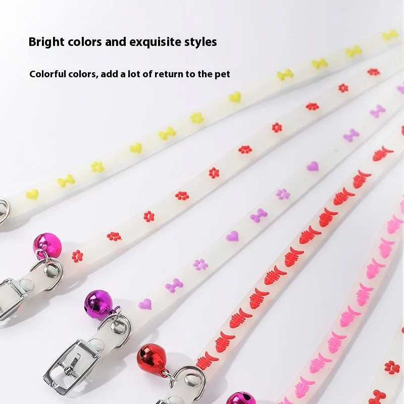 Cat luminous collar with night glow feature showing adjustable silicone chain and metal bell attachment