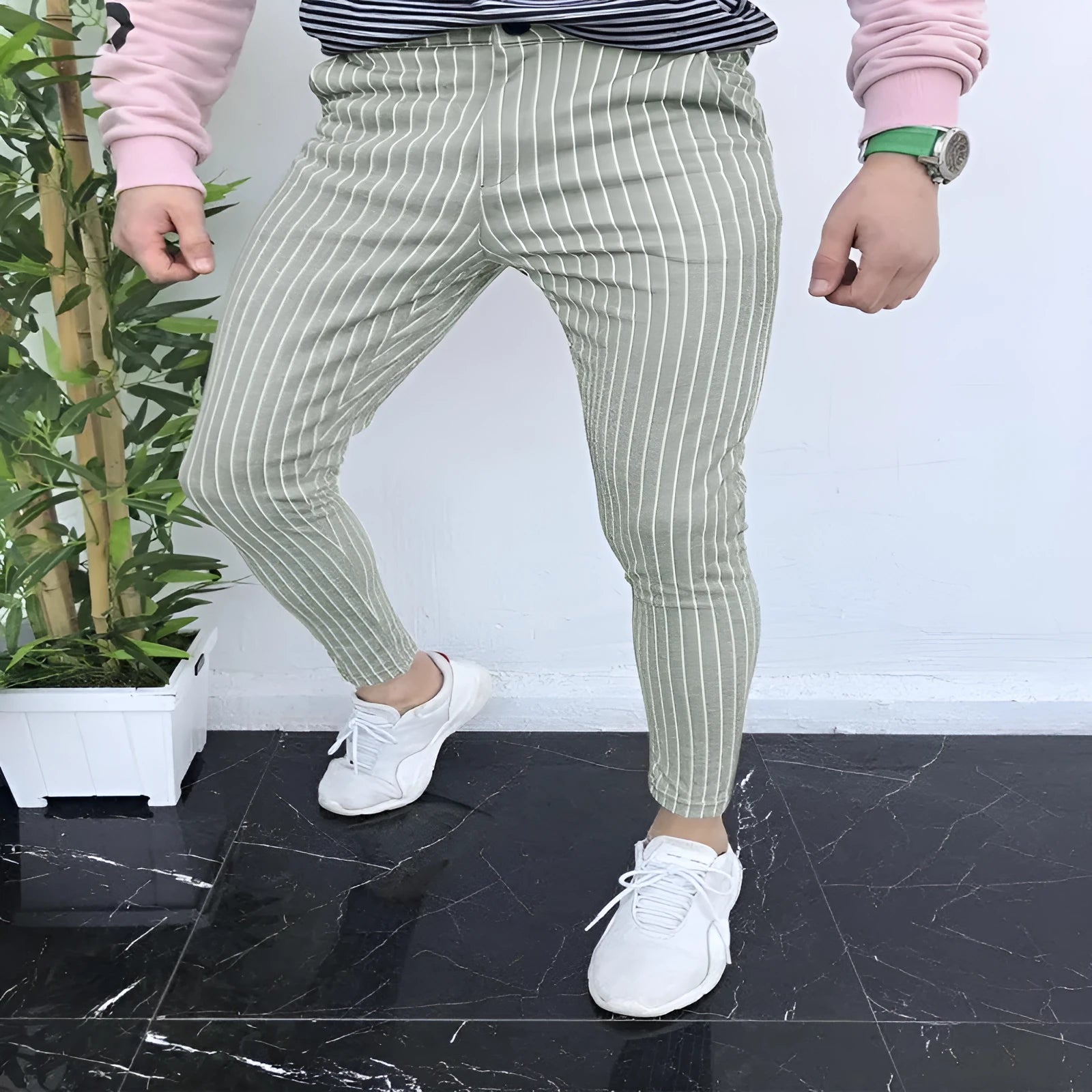 Men's slim-fit straight-leg casual trousers in a grey 3D printed plaid pattern, showing front view.