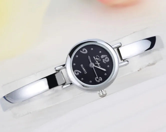 Women bracelet quartz wristwatch round dial silicone strap alloy case pin buckle silver rose gold