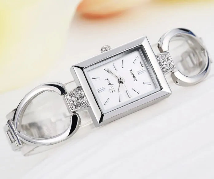 Women bracelet quartz wristwatch round dial silicone strap alloy case pin buckle silver rose gold