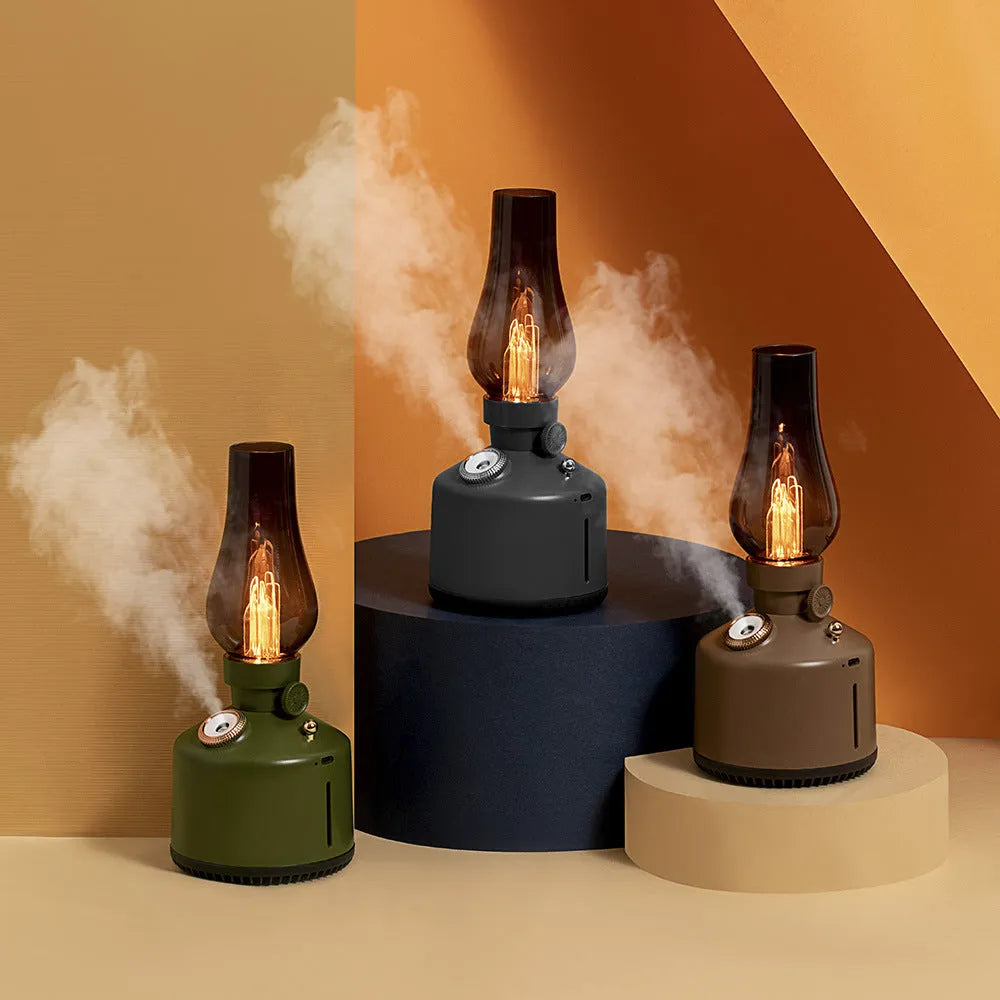 Kerosene lamp ultrasonic humidifier and aroma diffuser with ABS shell in brass color on a table