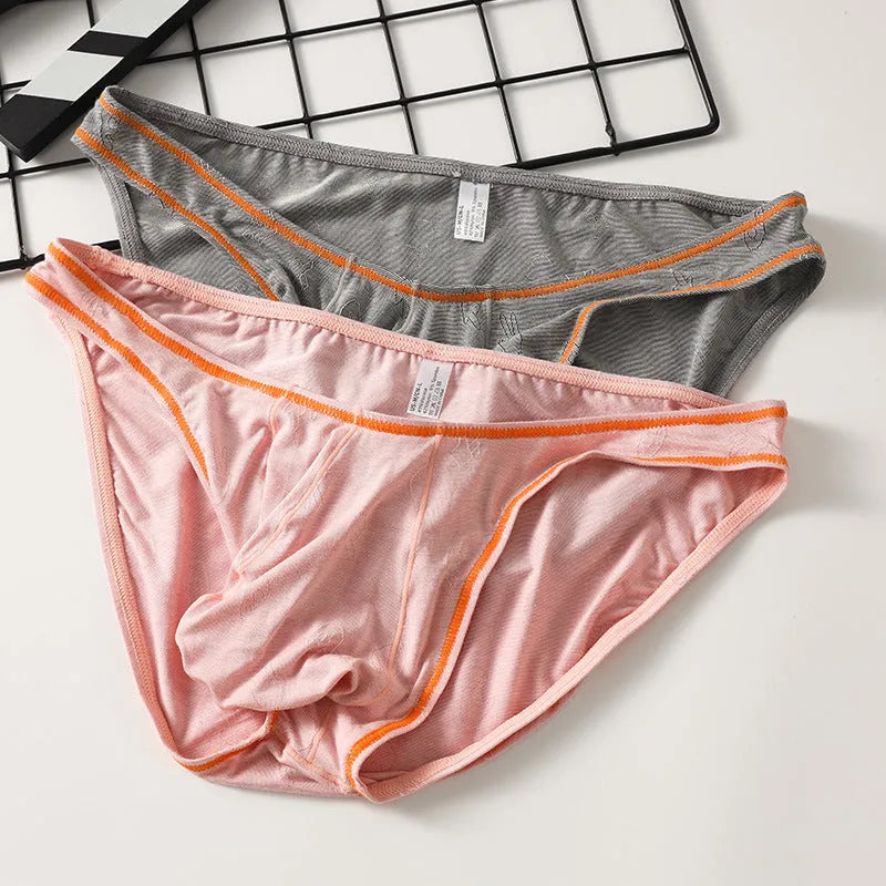 Men's ice silk modal hip-lift underwear shown in dark grey, colourful blue, pink, sky blue, and yellow green.