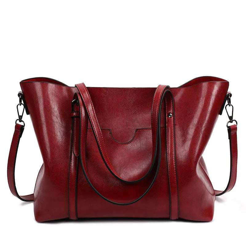 Retro brown PU leather women's messenger bag with large main compartment for A4 documents.