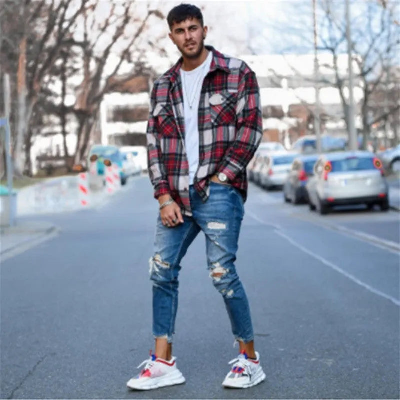 Deep blue men's jeans with distressed hole detailing on cotton fabric showing front and back views