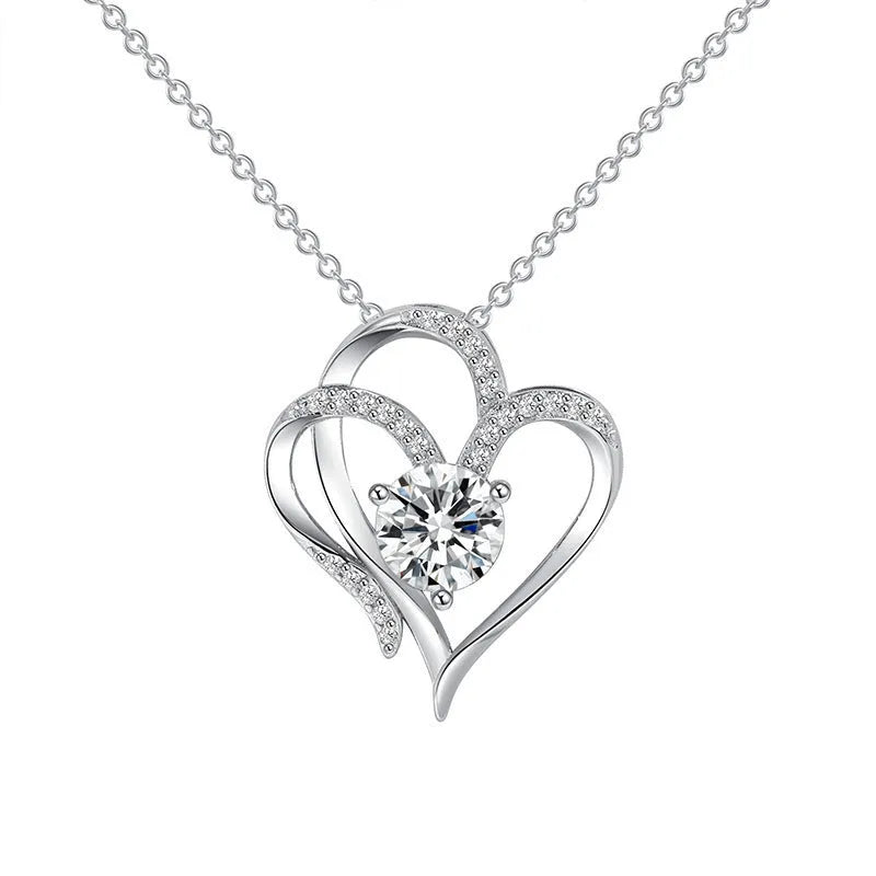 Close-up of a 925 silver heart-shaped pendant necklace on a chain.