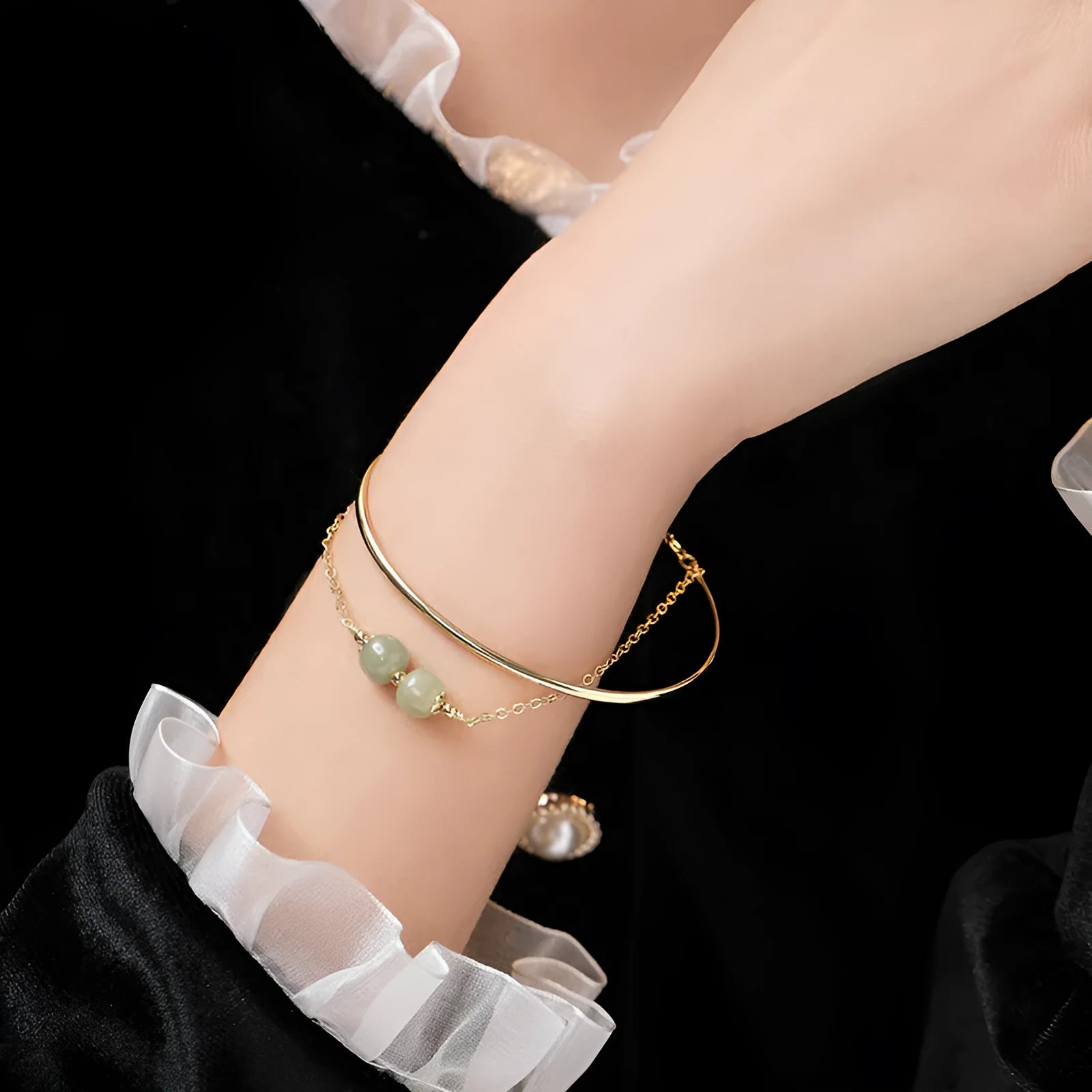 Jade lucky beads bracelet for women with gold inlay detailing showing single, double and three beads versions