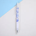 Set of six cream bear press pen knives with various animal designs on a white background