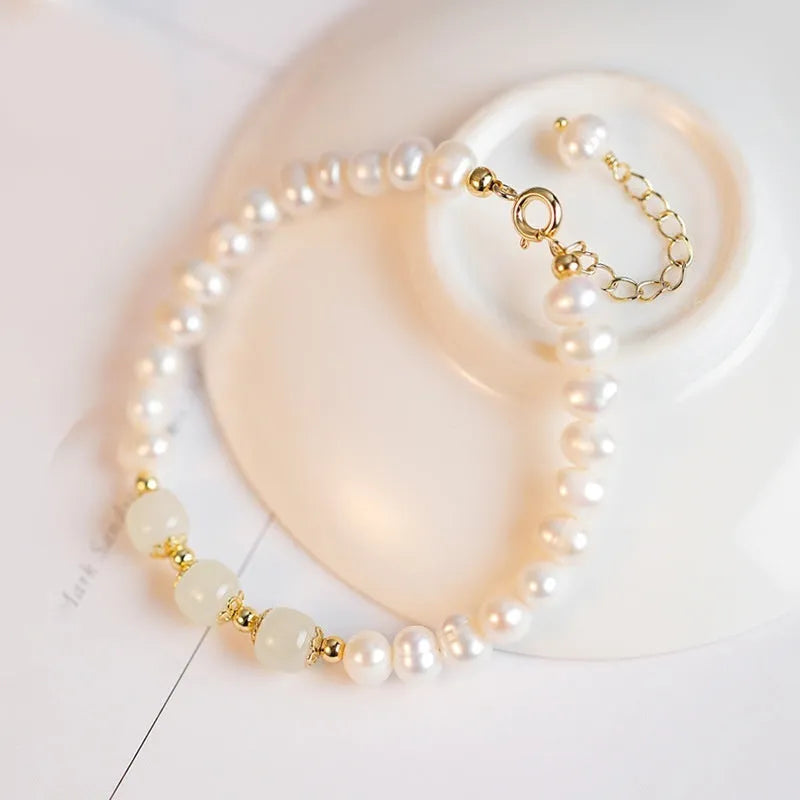 Natural freshwater pearl bracelet with diamond-shaped beads in Korean style, shown in deep Hetian jade colour.