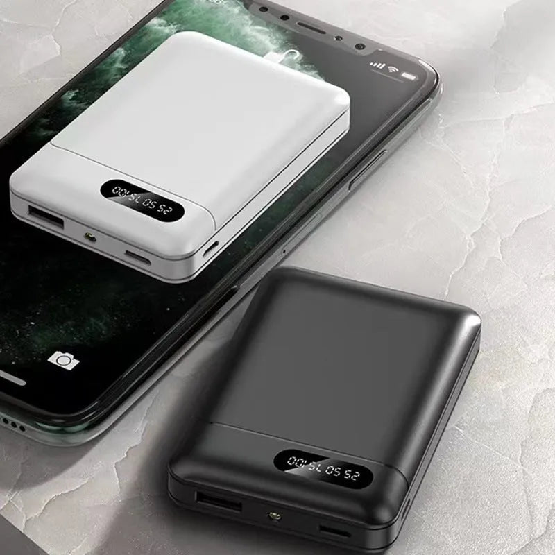 Black and white 10000 mAh portable power bank showing USB ports and dimensions