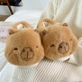 Light brown women's winter plush slippers with artificial wool lining and PVC sole