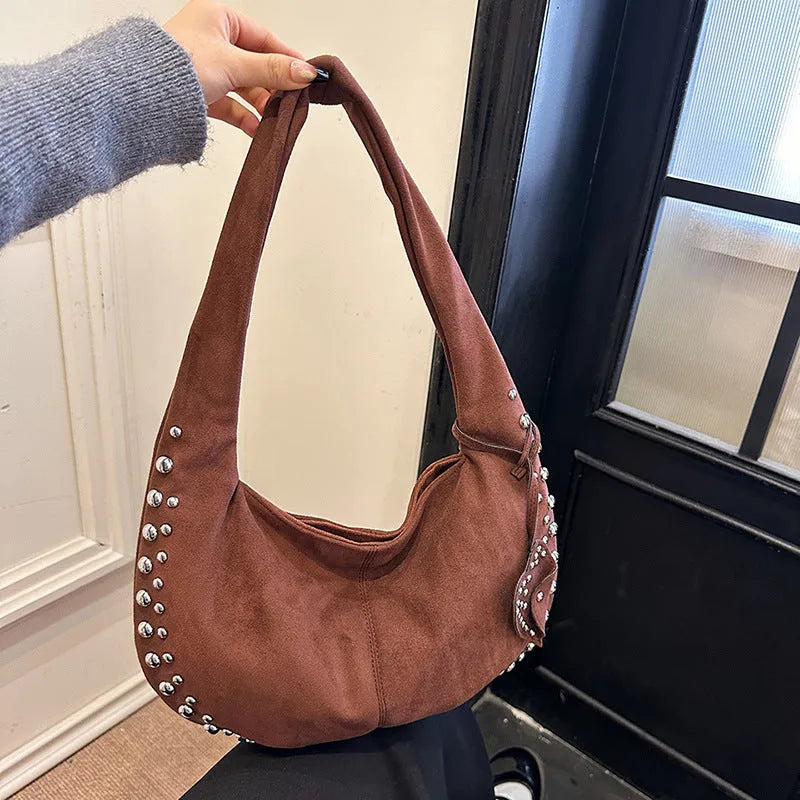 Soft plush underarm tote handbag in retro style showing black colour variant