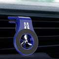 Magnetic car phone holder mounted on air vent with smartphone attached and perfume slices