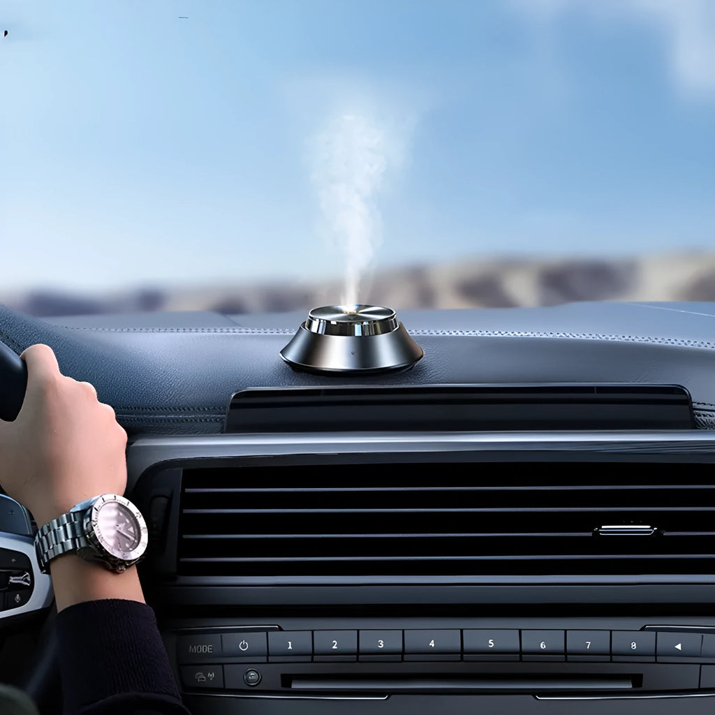 Black butterfly-shaped car aromatherapy diffuser with USB cable and 50ml essential oil bottle