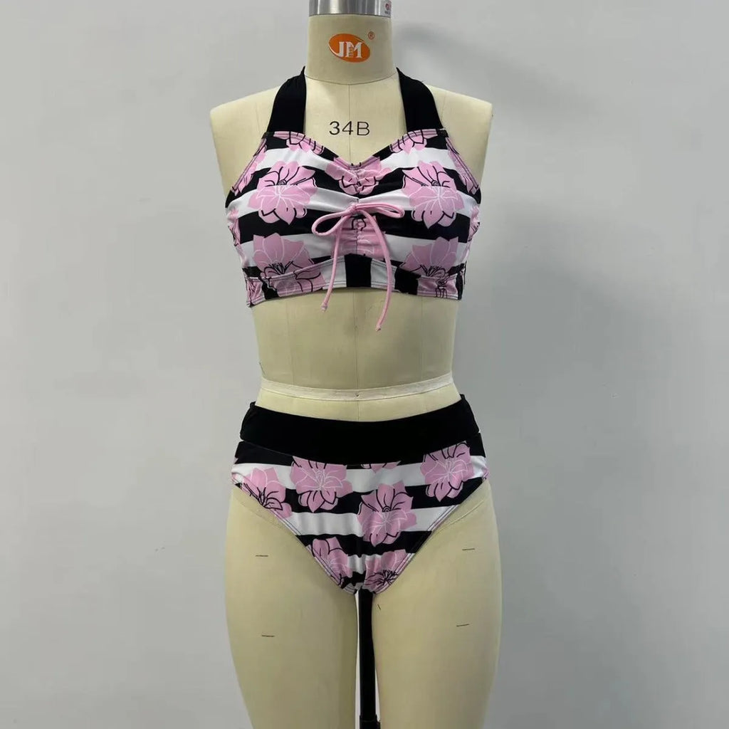 Black women's two-piece bikini swimsuit with printed belly cover design.