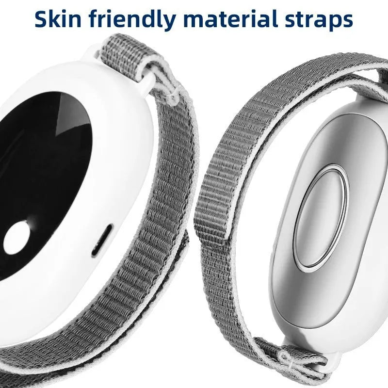 White sleep aid bracelet device with remote control and 20 intensity gears on a USB charging cable