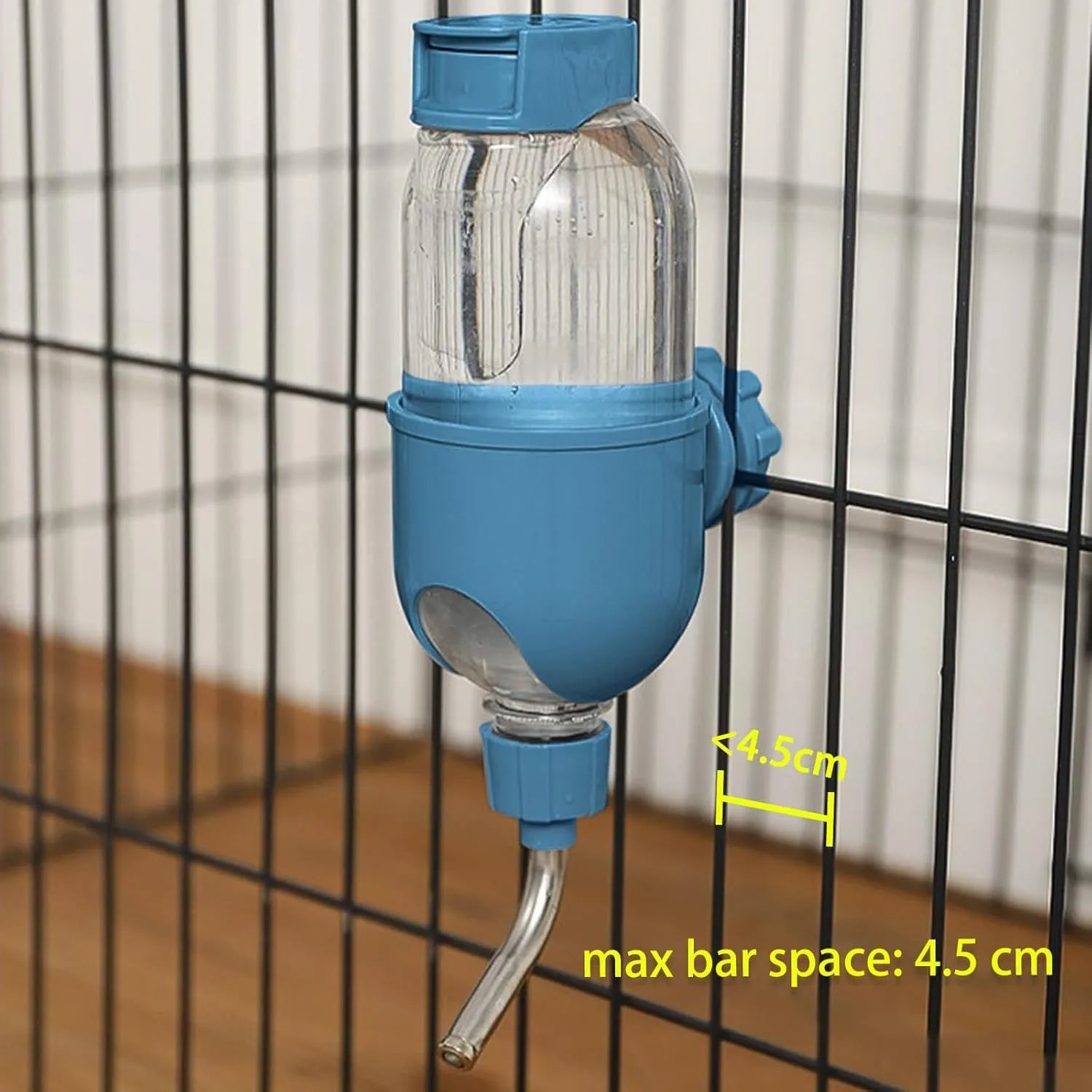 Blue small animal water bottle with rotatable nozzle attached to a cage, showing 500ml capacity.
