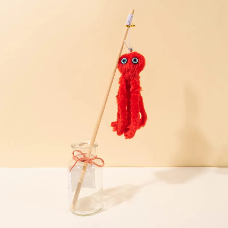Octopus-themed furry cat toy with realistic eyes on 40cm flexible stick in pink colour