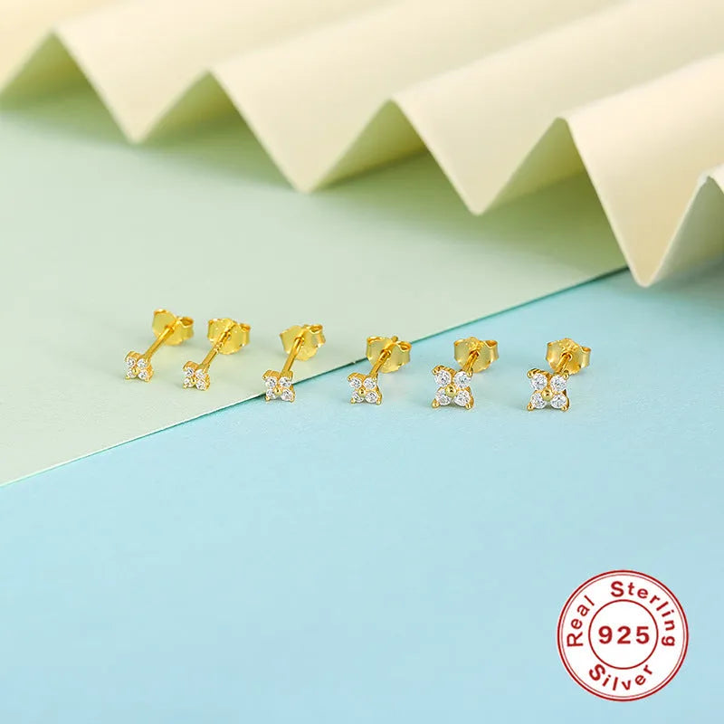 Geometric petal crystal flowers stud earrings in sterling silver with gold or platinum finish.