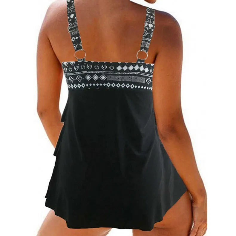 Plus-size women's split swimsuit with double shoulder straps and a decorative bow, shown in picture colour.