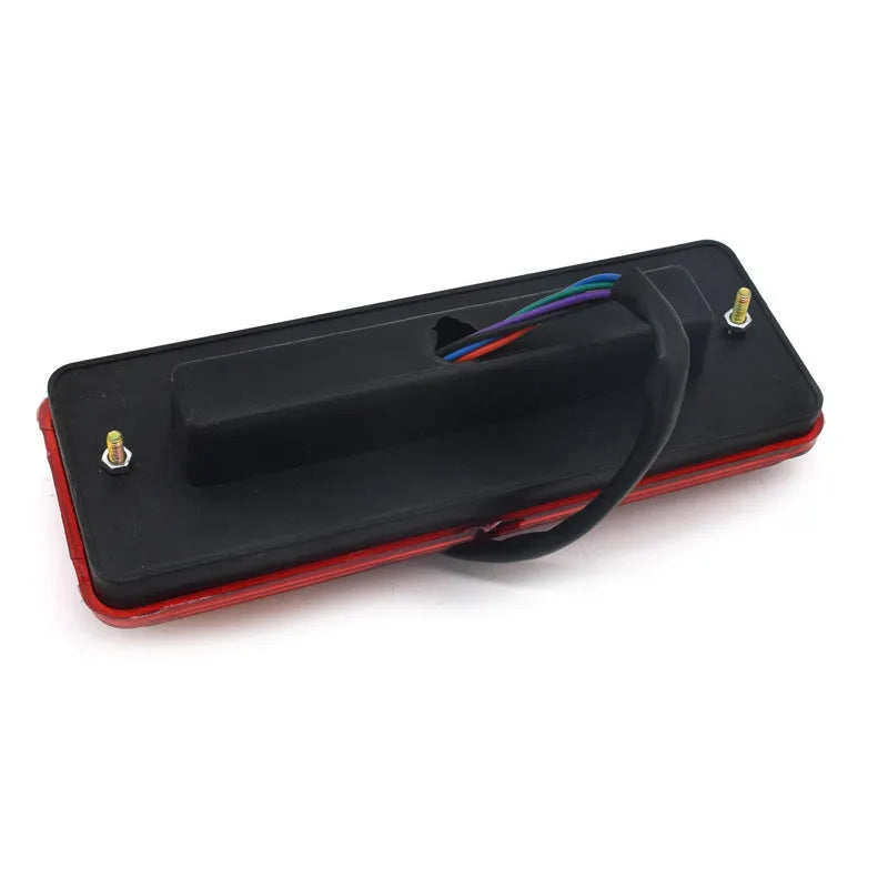 Black semi-closed taillight for electric tricycle, 200mm wide by 70mm high.