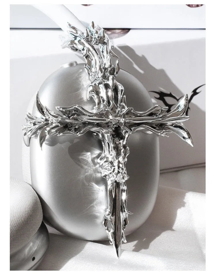 Gothic cross patterned resin cover for Apple AirPods Max headphones in silver colour