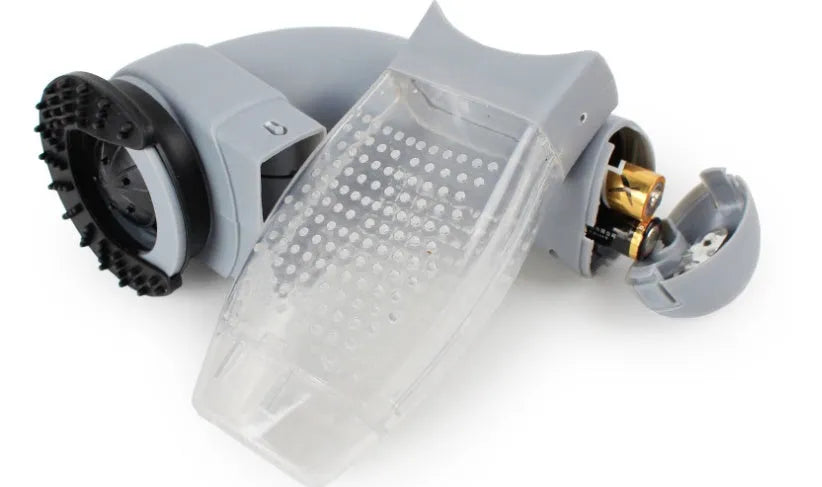 Grey handheld pet hair vacuum cleaner with soft rubber grooming head for dogs and cats