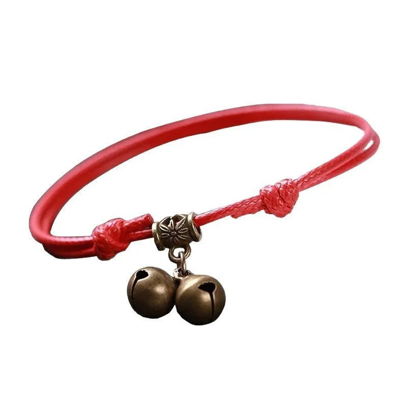 Adjustable nylon rope dog collar with a brass bell, shown in black, red, and coffee colour options.