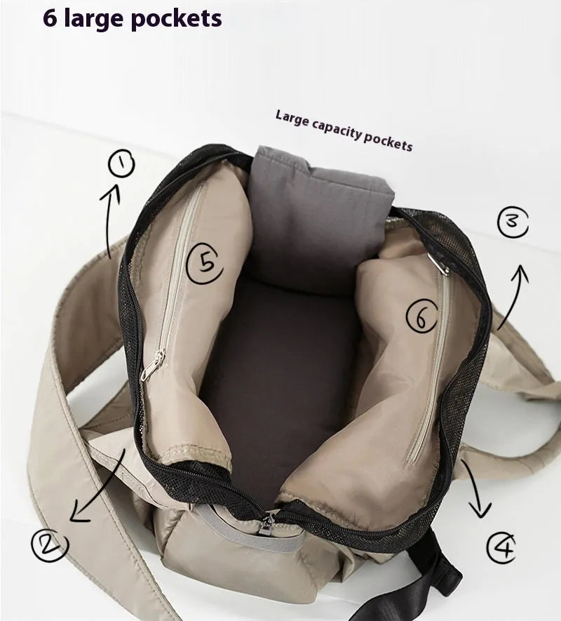Apricot-colour cloth pet carrier handbag for small pets, showing single handle and rectangular shape.