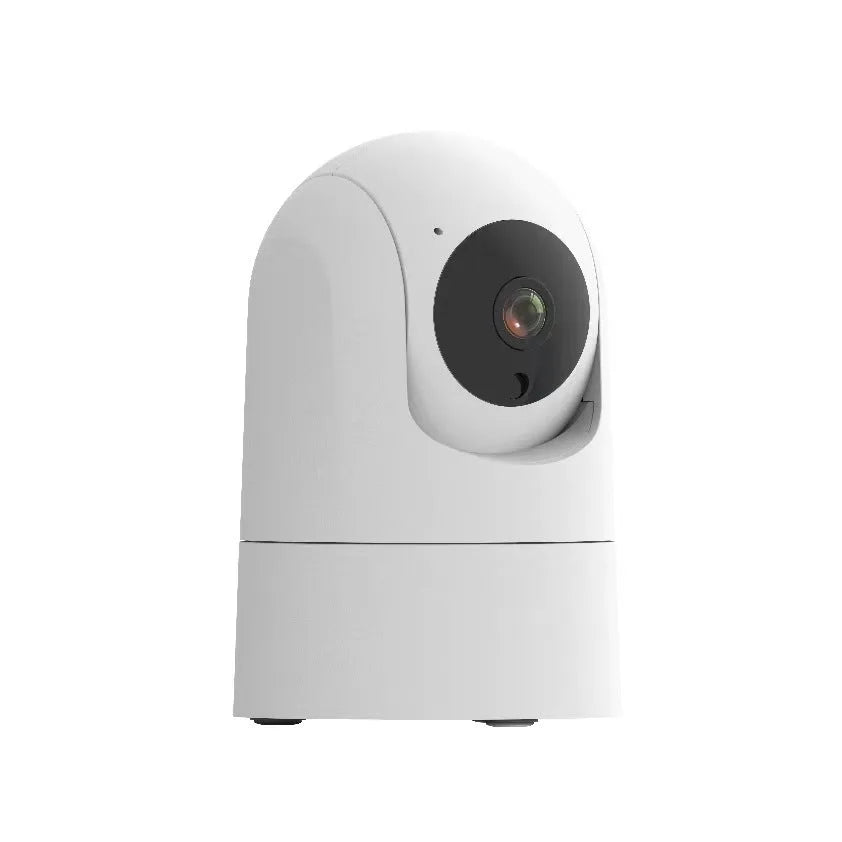 White indoor smart security camera on a table with UK power plug