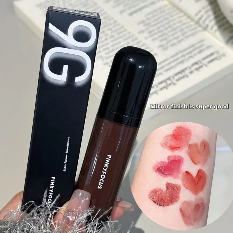 Black Shiny Mirror Lip Lacquer tube showing glossy finish with six shade options displayed