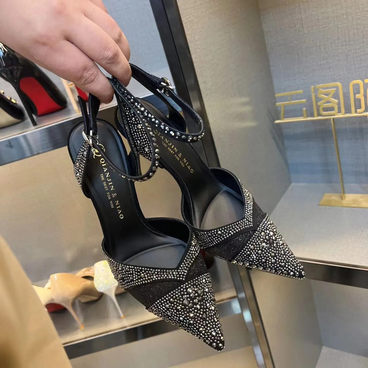 Women's hollow high heels with red sole and stiletto heel in black or silver colours
