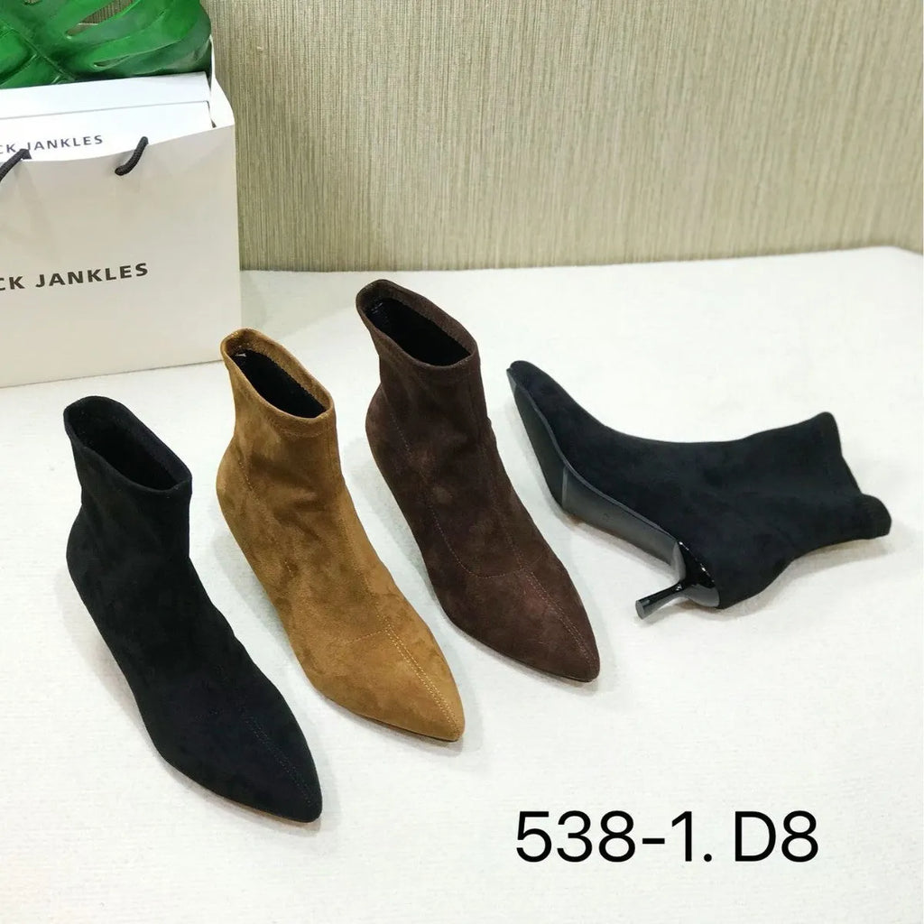 Women's black pointed toe ankle boots with stiletto heel and mid-calf length