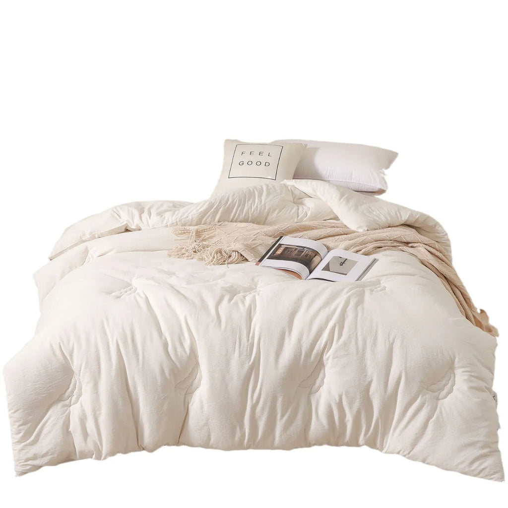Soybean fibre pure cotton quilt shown in grey, pink jade or white colour on a bed.