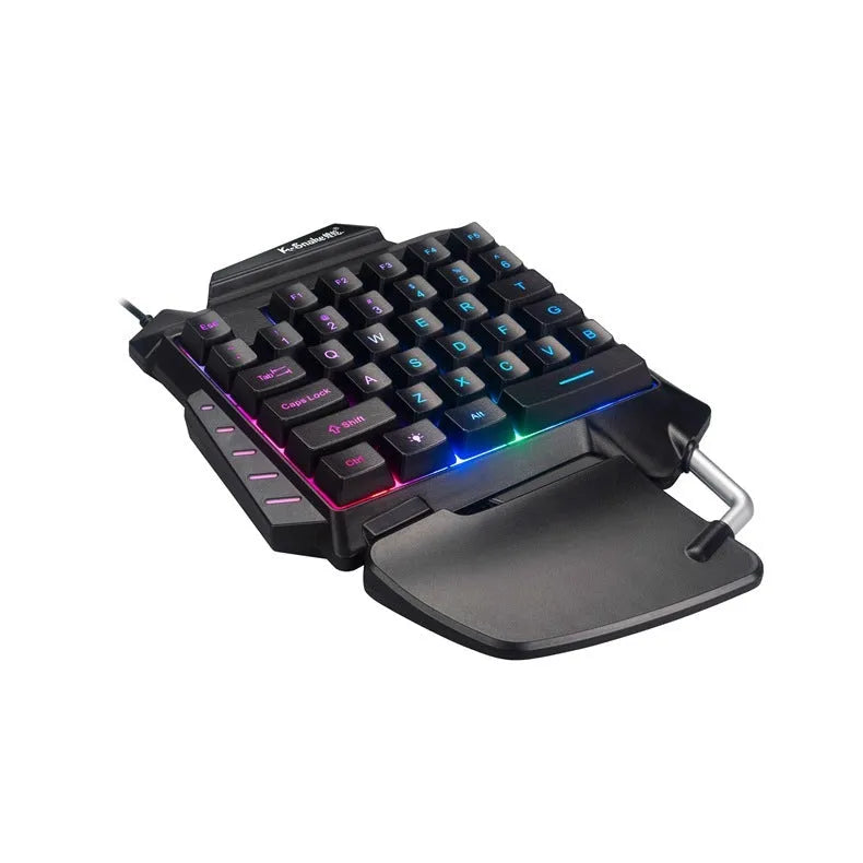 Black one-handed left-hand gaming keyboard with integrated wrist rest and USB connector for desktop mobile gaming